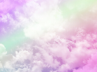 Fototapeta premium beauty sweet pastel pink and green colorful with fluffy clouds on sky. multi color rainbow image. abstract fantasy growing light
