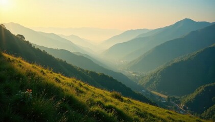 Fototapeta premium Gentle morning light creeps over valley hills, shadow, soft, mist