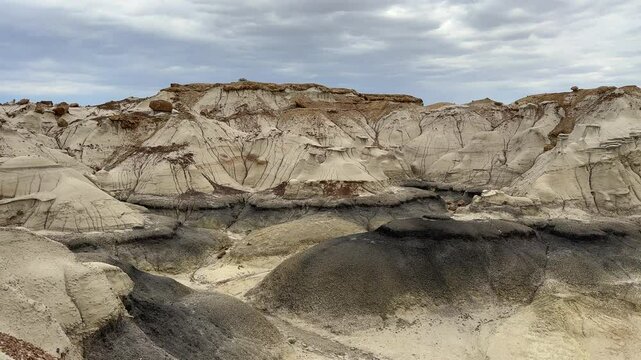Hiking in Bisti Badlands near Farmington New Mexico, Bisti De Na Zin Wilderness, authentic natural landscape scenery with otherworldly Mars surface