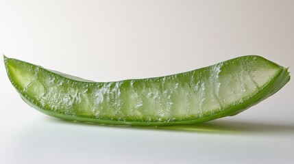 Close-up of a vibrant aloe vera slice, showcasing its natural beauty and health benefits