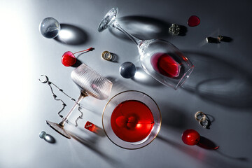 silver background with glasses and red accents