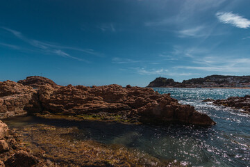 Mediterranean landscape with mountains and town in the background