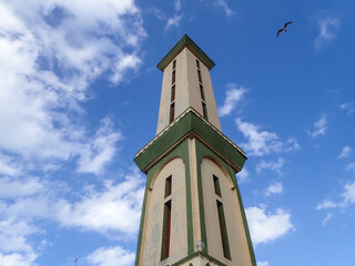 Obraz premium Muslim mosque for prayer and worship of Allah, Omar bin Abdul Aziz Mosque, Jijel State, Algeria, North African mosques in village on Mediterranean coast, Minaret and dome of mosque, Ramadan iftar.