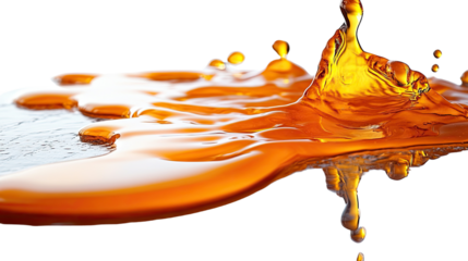 Liquid Gold: Captivating droplets and streams of rich amber liquid cascade and pool, displaying the mesmerizing effects of viscosity and motion, a sensory experience.