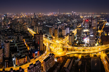 Aerial view of overpass in Shanghai financial district at night