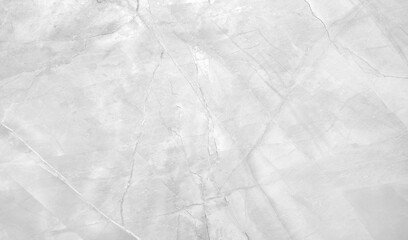 A white background with a crack in it. The crack is jagged and uneven. white gray rough texture background as banner template