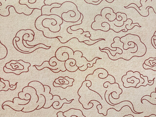 Close up of Chinese cloud illustration pattern on a beige background. Chinese clouds vector, commonly used for decoration. Suitable for wall paper, upholstery. Seamless  texture