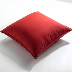 A red pillow, vibrant and cozy, adds warmth and color to any space, creating a bold