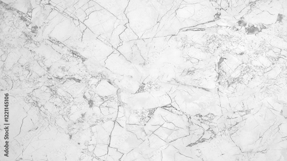 Aufkleber A white marble wall with cracks and holes. The wall is smooth and shiny, but the cracks and holes give it a rough and aged appearance. The contrast between the smooth surface