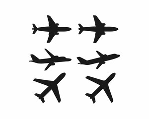 Simple black silhouettes of various airplanes.