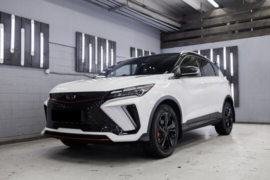 car parked in the lot Geely Coolray SUV detail car