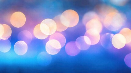 Abstract blurred bokeh lights in blue, purple, and orange.