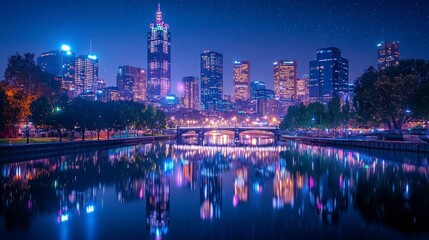 Obraz premium Stunning Night View of Melbourne City Skyline and Yarra River Reflection