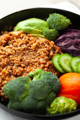 Healthy buckwheat bowl with assorted vegetables. A nutritious and delicious meal.