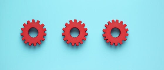 A vibrant arrangement of red gears set against a soothing blue background. This image symbolizes innovation, teamwork, and the mechanics of progress in a visually striking way.