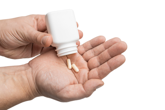 Male hand pouring white medicine capsules from plastic bottle into a palm, antibiotic pills, vitamins, painkillers, isolated on transparent background. healthcare and treatment concept
