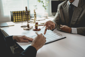 Lawyers discussing contract terms and conditions in courtroom
