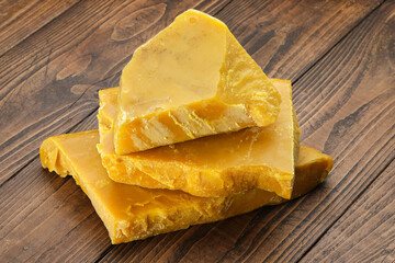 Natural beeswax chunks, handcrafted by a beekeeper, perfect for candle making, cosmetics, or DIY crafts. Rustic, eco-friendly, and versatile.  