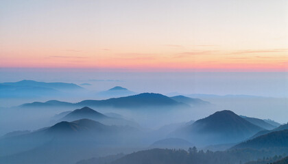 Fototapeta premium Misty mountain landscape at dawn, serene natural beauty