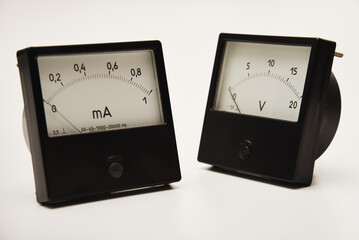 Voltmeter and ammeter on a white background. A means of measuring electric current and voltage.