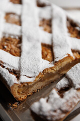 Fototapeta premium Homemade american traditional apple pie with powdered sugar