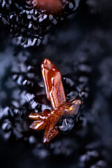 red Realgar. Specimen from La ricamarie, St Etienne, France. Micro photography extreme close-up. microscope mineral crystal photography for Scientific use.
