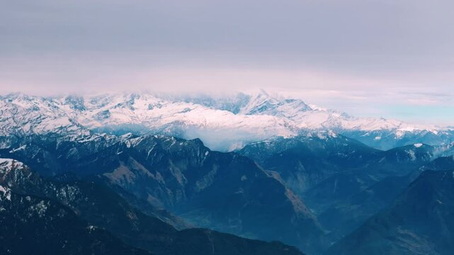 aerial shot of Nanda Devi peak covered in snow, highlighting the beauty of the Himalayas