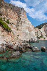 Turquoise water of a secluded Plakaki Beach located on Zakynthos Island in Greece