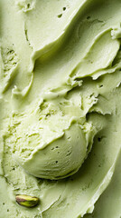 Fototapeta premium Vertical photo of a refreshing pistachio ice cream close-up