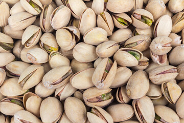 Fototapeta premium Pistachios texture background pile organic