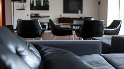 Modern Lounge Area With Stylish Black Chairs and Cozy Sofas, Perfect for Relaxation or Casual Meetings