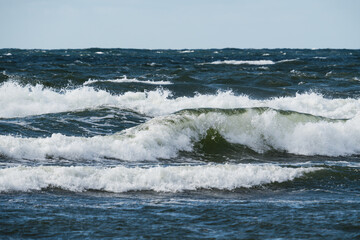 Untamed power of nature: The stormy Baltic Sea with high waves in Estonia.