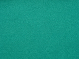 Emerald felt texture bathes the senses in a sea of calm, a serene escape into a world of quiet contemplation