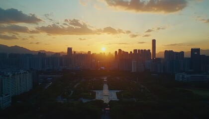 Sunset Over a Bustling Urban Skyline With Towering Buildings and Reflections on Water in the Cityscape