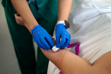 nurse providing care to an ICU patient