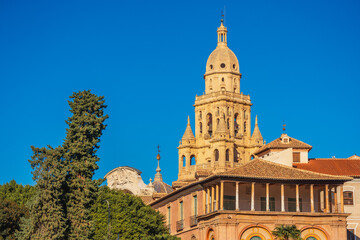 View the beautiful bell tower of a cathedral, one of the most famous landmarks in Murcia, Spain