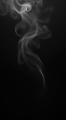 Fototapeta premium Smoke is rising from a cigarette on a black background