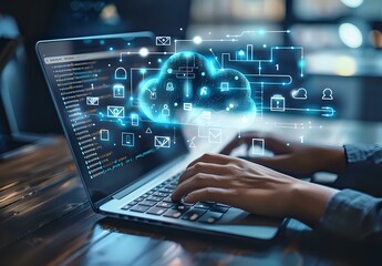 Futuristic cloud computing technology concept with glowing holographic icons floating above laptop keyboard while person works in dark office environment.