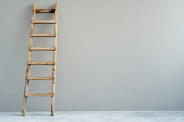 Wooden ladder on a plain background with soft light. Business background