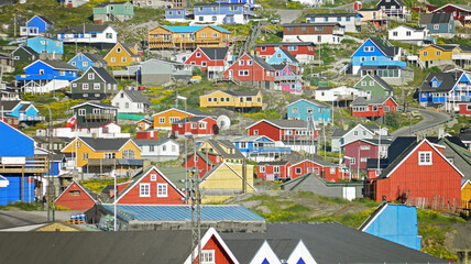 Colorful houses of Qaqortoq, Greenland. The houses are all different colors and sizes © bonilook