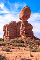 Fototapeta premium A large rock formation with a small peak on top