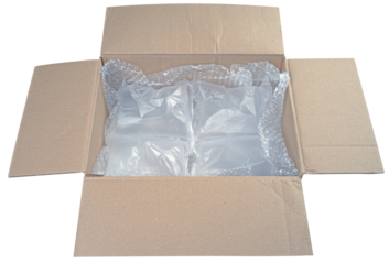 Cardboard box with plastic bubble wrap to protect shipment. Isolated background.