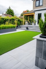 Fototapeta premium A residential property with a lush grassy area and some greenery