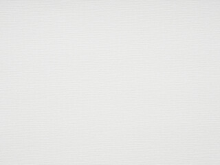 A crisp white paper canvas textured by light, ready to absorb colors and stories yet untold