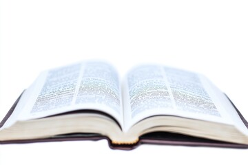 A personable book sitting on a flat surface with a wooden or glass table