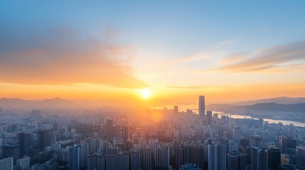 Obraz premium A breathtaking view of the city skyline during sunset, showcasing vibrant colors and towering buildings against a backdrop of clouds and a shimmering river.