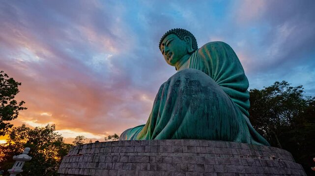 Time lapse amazing golden sunrise at f Phra Yai Wat Phra That Doi Phra Chan (Daibutsu) on the mountain in Lampang Thailand. Bright blue sky. Clear skies and natural beauty background.