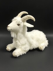 Obraz premium A stuffed white goat laying on a black background. The goat is fluffy and has horns. Concept of comfort and warmth, as the stuffed animal is soft and inviting