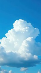 Obraz premium Fluffy white cumulus cloud against vibrant blue sky , vapor, serenity