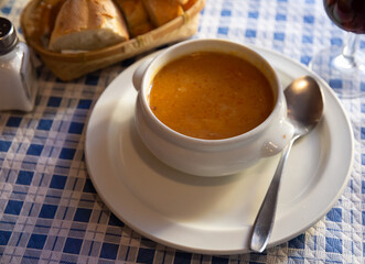 Bowl of hearty vegetable soup. Healthy vegetarian lunch..